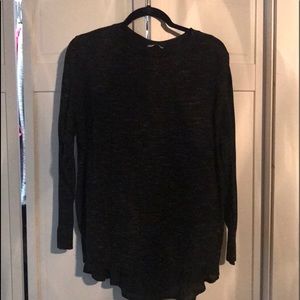 Sweater with faux attached blouse.